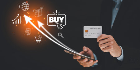 Businessman holding credit card and arrow icon market graph on Internet on the laptop computer with...