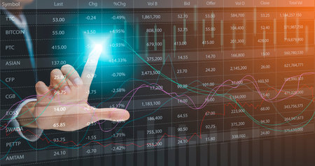 Businessman touchscreen line of Stock market or forex trading graph and candlestick chart suitable...