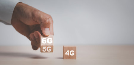 Businessman hand change wooden block cube symbol from 5G to 6G communication and 6G concept....