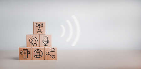 communication and technology concept ,wooden block cube symbol telephone, email, address. Website page contact us or e-mail marketing, Contact us in customer support concept.の写真素材