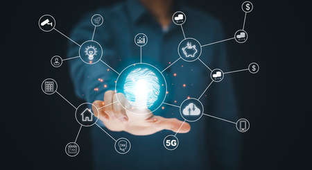 Business touch scan fingerprint of a media screen, internet of things. new technology big data and business process strategy, automate operation, customer service management, online market conceptの写真素材