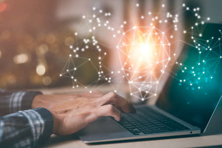 thinking and creative concept, Close up the light bulb and working on the desk, Creativity, and innovation are keys to success,  new idea and innovation with Brain and light bulbs, working at homeの写真素材