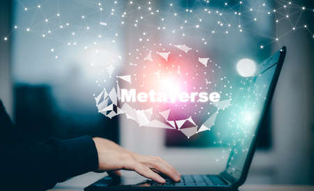 New metaverse with icon business concept,Business using laptop and virtual globe with financial icons future technology, business goals, online communication,graph Screen Icon of media screen,big dataの写真素材