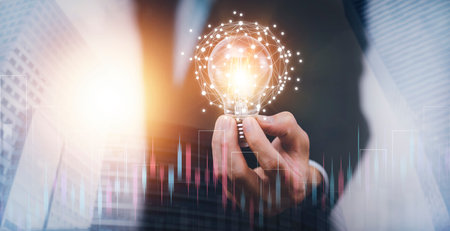 Businessman holding light bulbs, ideas of new ideas with innovative technology and creativity,...