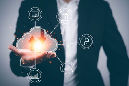 Businessman hand holding a cloud networking concept and touch screen with hand connection line on...
