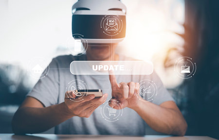 Man wearing VR glasses virtual with Update Software Computer Program Upgrade Technology Internet, Update on virtual screen.Internet and technology concept,loading bar with installing the updateの写真素材