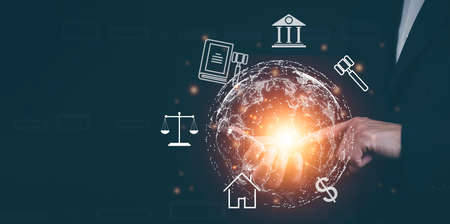 Businessman Hand hold the graph labor law attorney legal business concept internet technology,Planning buy Real Estate, Planning to buy property and Choose the best, financial liabilities conceptの写真素材