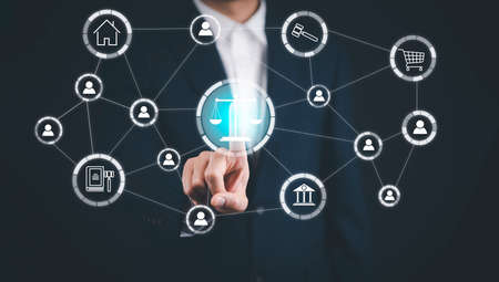 Businessman touch the graph labor law attorney legal business concept internet technology,Planning buy Real Estate, Planning to buy property and Choose the best, financial liabilities conceptの写真素材