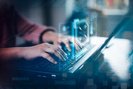 Concept financial transactions online, businessman use laptop with point at financial analyzing data while discussion, planning brand promotion budget, raising company awareness in social mediaの写真素材