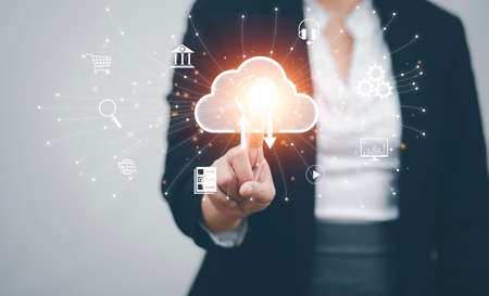 Woman touch line connect to data information on the Cloud Computing Technology Internet Storage Network Concept And a large database big data Through internet technology, Cloud sharing downloadの写真素材