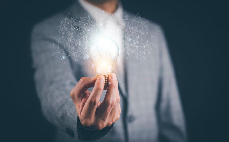 Creativity in the hands of business people idea concept, Businessman holding glowing light bulb with...