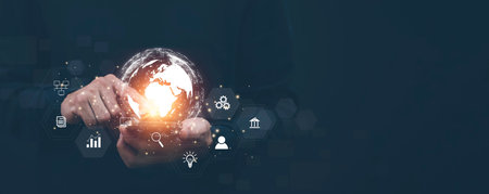 Smartphone with icon business concept,Business hand holding a virtual globe with financial icons...