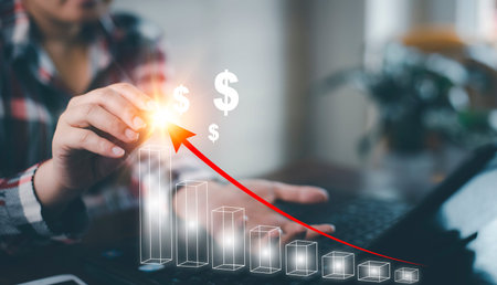 Businesswoman write growth graph losses on the stock market chart concept, Business use pen touch...