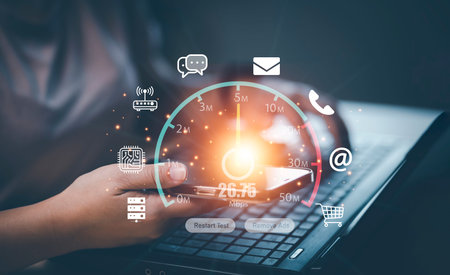 Fast internet connection with Metaverse technology concept, Hand holding smartphone and Virtual screen of Internet speed measurement,Internet and technology concept, 5G Hi speed internet conceptの写真素材