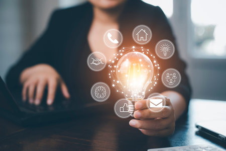thinking and creative concept, Close up the light bulb and woman working on the desk, Creativity,...