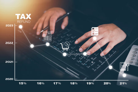 Concept of tax payment optimisation business finance,Man using calculator and taxes icon on...