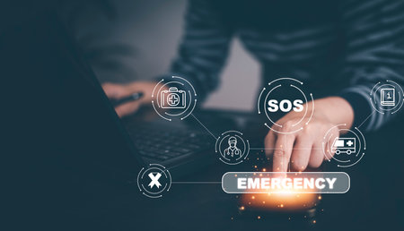 Hand touch button Emergency app in home, call phone, Chat message icon, Emergency application from smartphone for elderly, technology concept.Old hand touch mobile phone and call for help.の写真素材