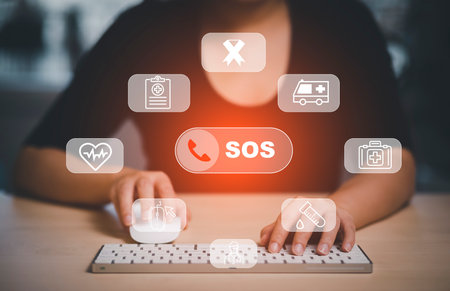 Woman using Smart Phone with Emergency app in home, call phone, Chat message icon, Emergency application from smartphone for elderly, technology concept.Old hand touch mobile phone and call for help.の写真素材