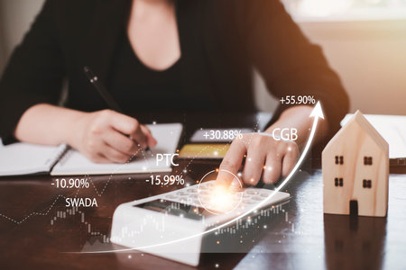 Concept of tax payment optimisation business finance,Man using calculator and taxes icon on...