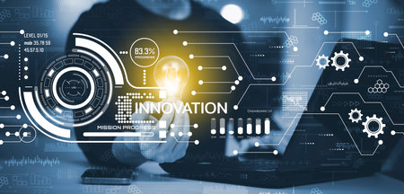 Businessman holding glowing light bulb with Innovation with Graphical User Interface Concept, Innovative ideas presented by management consultants on-screen, design, invention developmentの写真素材