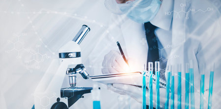 biochemical research scientist working with a microscope for the virus,Doctor man write a history of...