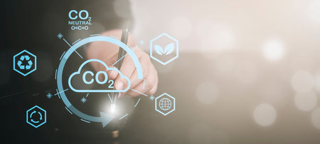 Hand hold Smartphone and global network connection with virtual modern reduce co2 emission concept...