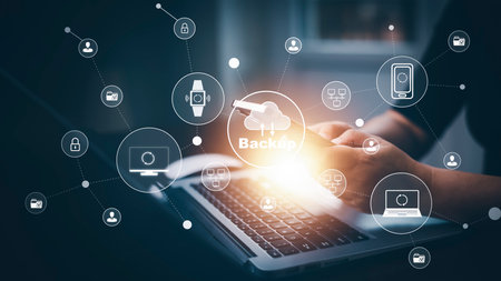 Software Internet data storage backup, Businessman using a computer to backup storage data Internet technology for backup online documentation database and digital file storage system, sharing Folder.の写真素材
