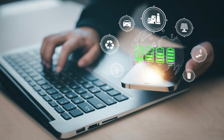 Businessman using laptops and touch recycle symbol with virtual modern reduce CO2 emission concept with icons, global warming emissions carbon footprint climate change to limit global warming, energyの写真素材