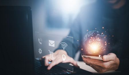 Businessman hold smartphone technology with 5G of mobile telecommunication network in Europe for...