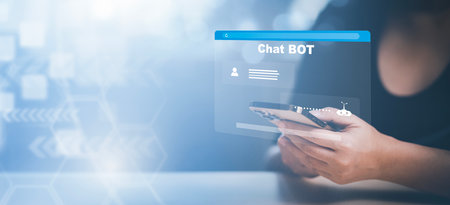 Man using Laptop or Smartphone With Chat GPT Chat with AI, Artificial Intelligence,System Artificial intelligence an artificial intelligence chatbot, Digital chatbot,robot application, conversationの写真素材