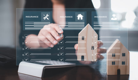 Sign insurance form agreements concept, Businessman signs insurance contracts  e-signing digital online, document management, concerning mortgage loan offer for and house insuranceの写真素材