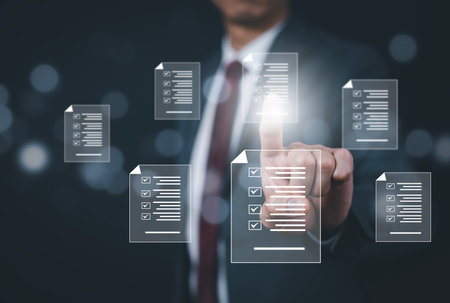 Business people hand touch Online documentation database, complete the online survey form, answer the test questions. Marked checklist on a clipboard. Human resources and management concept, BigDataの写真素材