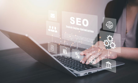 Businessman using a computer for analysis SEO Search Engine Optimization Marketing Ranking Traffic...