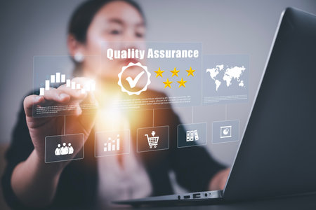 Woman touching Quality assurance of business services, Smartphone shows the sign of service and ISO certification, the Quality certificate is compliant, and the Check mark symbol represents standard quality control.の写真素材