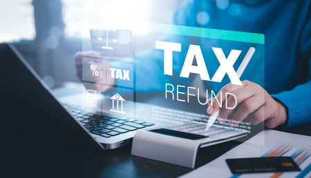 Concept of tax payment optimisation business finance,Man using calculator and taxes icon on...