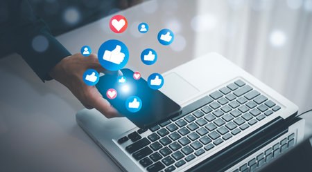 Hand holding smartphone and Social media and digital online concept, smart phone with Social media,...