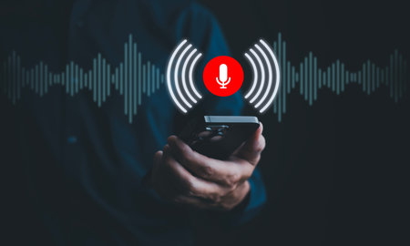 Businessman using mobile and touch microphone button on virtual screen. Blog blog speak talk...