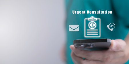 Health insurance and medical inquiry form concept. The doctor holds a Smartphone with a checkbox for Health status in the Health Status evaluation form and hospital Contact documents.の写真素材