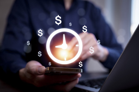 Businessman hand pointing sign clock. Concept business time is money , reduced time work to have time and management planning increases efficiencyの写真素材
