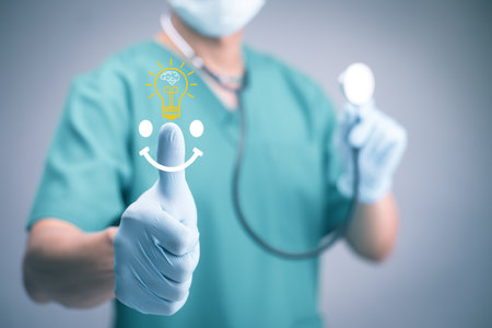 Doctor's hand gives thumbs up - pano medical banner background giving you the good news by making the ok thumbs up gesture on white background, Maintaining physical healthの写真素材