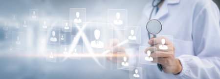 Medical doctor and medical technology and futuristic concept, Doctor using laptop and health medical network connection icon on virtual screen interface, Modern medical technology and innovation.の写真素材