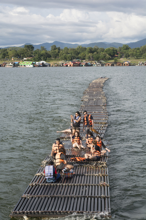 September 04, 2017 : Tourists floating on the river by wooden raft in Srinakarin Dam, Kanchanaburi, Thailand.のeditorial素材