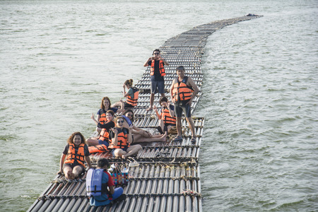 September 04, 2017 : Tourists floating on the river by wooden raft in Srinakarin Dam, Kanchanaburi, Thailand.のeditorial素材