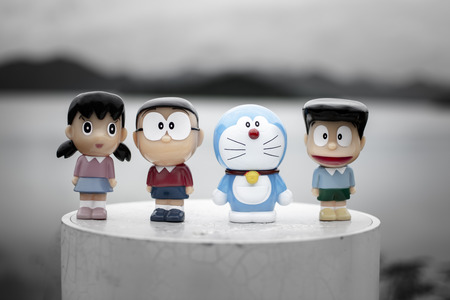 Phetcharburi, Thailand - August 14, 2018 : Cartoon model (Doraemon, Nobita, Shizuka, and Suneo) from Doraemon Series. Doraemon began as a manga series written by Fujiko F. Fujioのeditorial素材