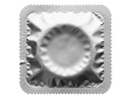 This image features a close-up view of a metal bottle cap with a textured surface, isolated against a white background. The cap is centrally positioned and has a serrated edge. The image is clear and SEO-friendly, making it suitable for various digital applications.の素材