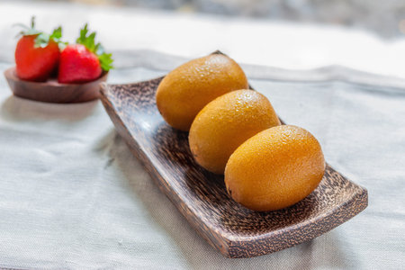 Kiwi fruit on a plateの写真素材