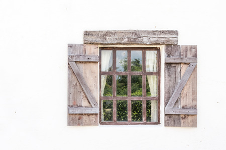 Classic wooden window on white wallの写真素材