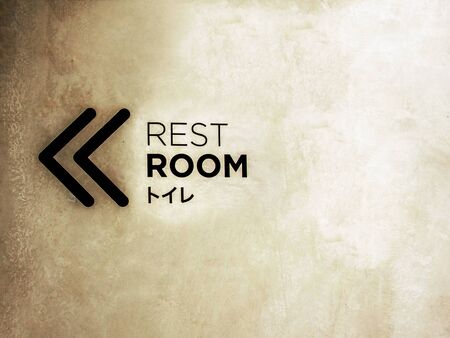 Signs rest room on the dirty wallsの写真素材