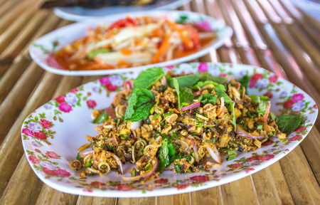 Minced Catfish Spicy Salad with Herbs.Local food of the Northeast Thailand (Isan). Spicyの写真素材