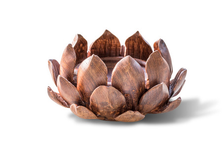 The lotus carved wood.isolated on white backgroundの写真素材